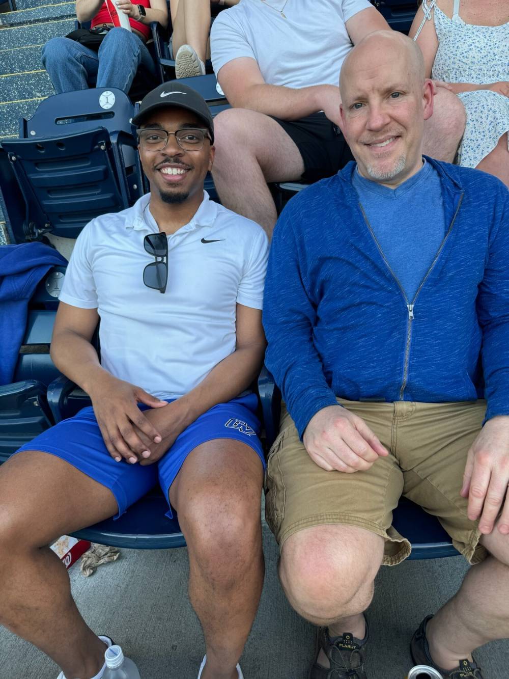 Two DC alumni at the game.